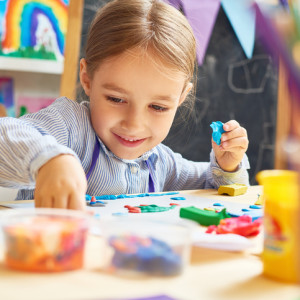 Happy Little Girl in Development School